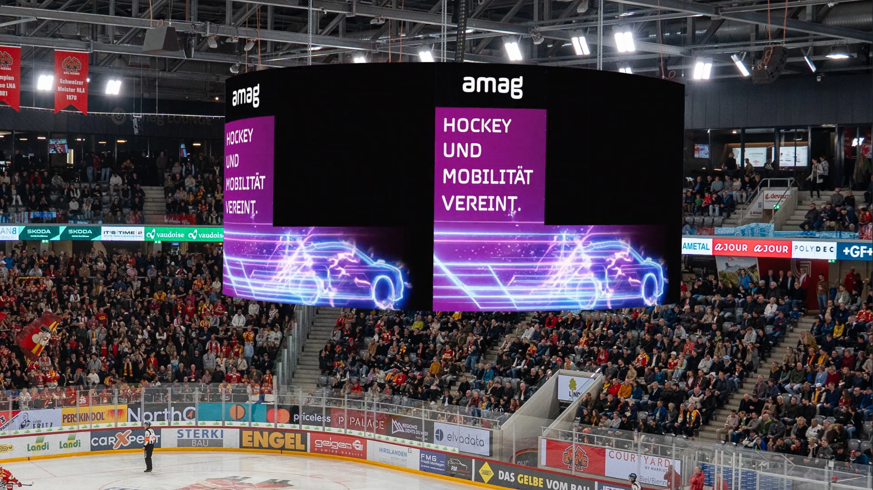 360° video cube by jls at Tissot Arena Biel showing AMAG motion content above the ice.