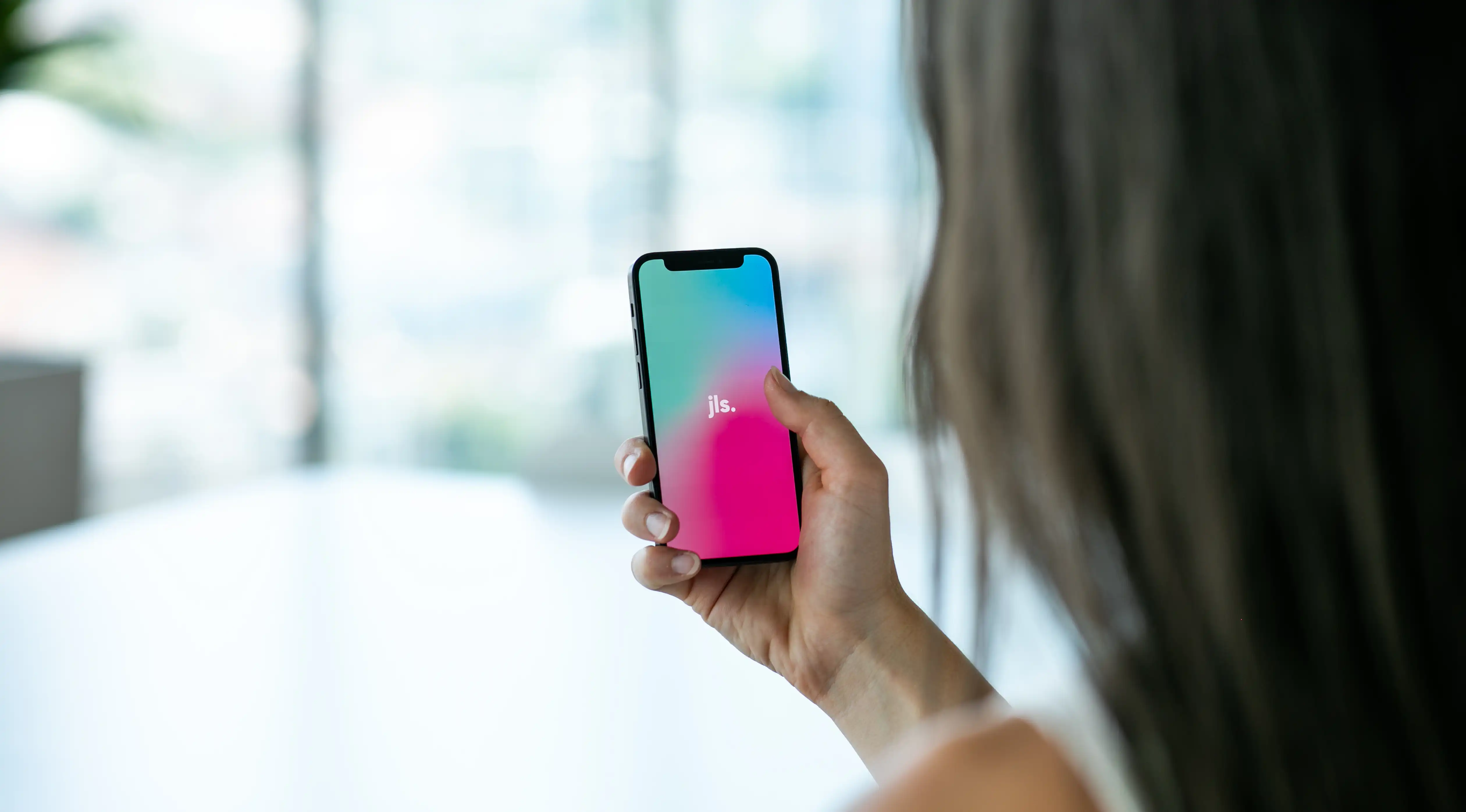 Woman has smartphone in her hand