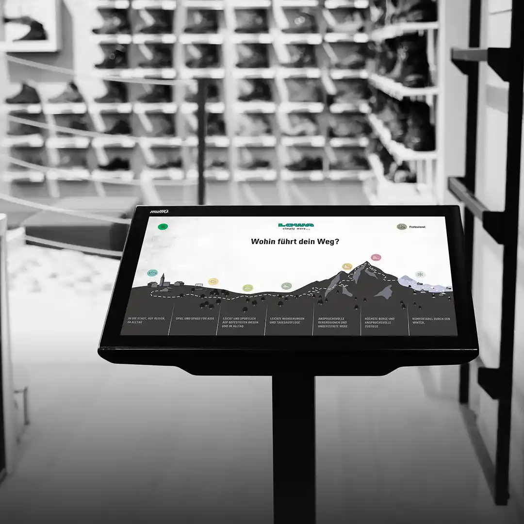 Interactive touchscreen in the LOWA store – web portal as a digital kiosk solution expands the product range and supports customers in their selection.