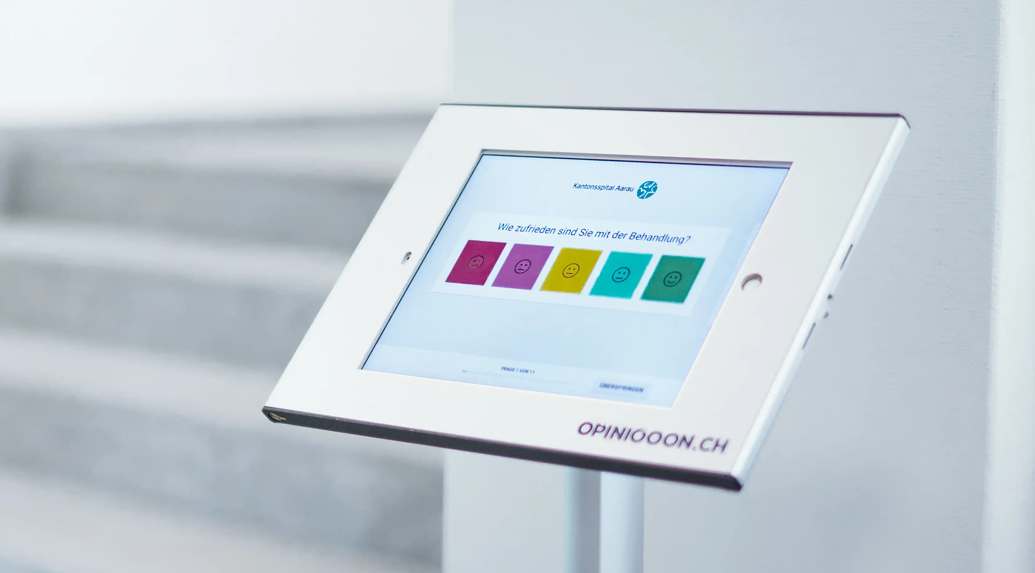 Tablet for surveying customer feedback using smileys